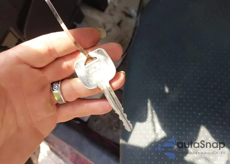 2007 Toyota Yaris из США, поврежденный, VIN JTDJT923975089104